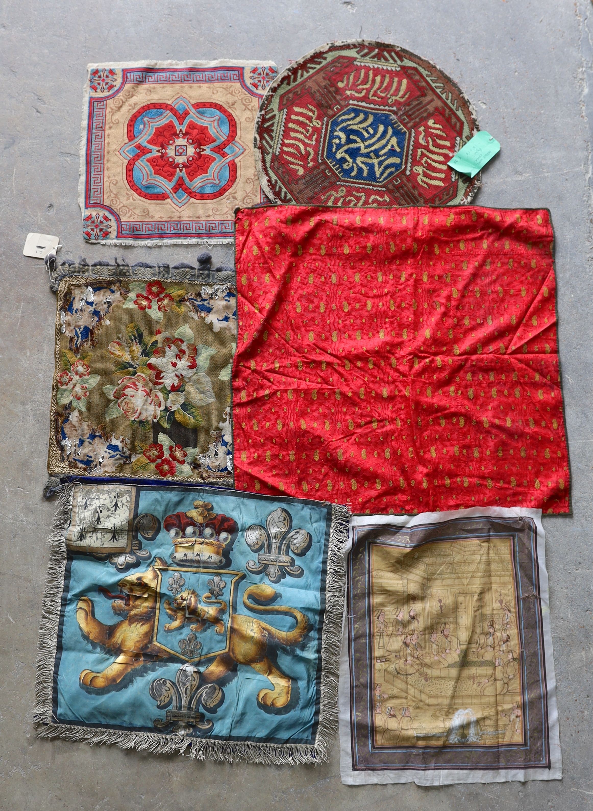 An Ottoman silk Koran cloth, three needle and bead work covers and assorted textiles